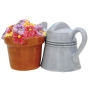From the Westland Giftware Mwah! Collection. Watering Can and Flowers Salt and Pepper Shakers. These sets are held together with magnets. Made of ceramic with glossy finish. Measures 2 Inches high. Hand wash only.
