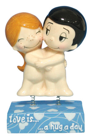 From the Love is... Collection. Love is... a Hug a Day Westland Giftware Bobble Figurine. 4.75 Inches High