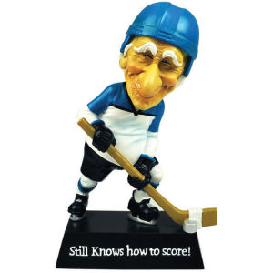 Coots Still Knows How to Score Hockey Bobble Figurine. Says Still Knows How to Score.  The Old Coots Collection, based on illustrations by artist Mike Dowdall. Measures 6 Inches High.