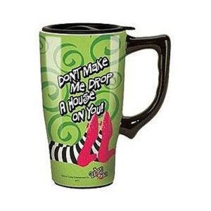 The Wizard of Oz Wicked Witch of the East Travel Mug with Handle. Hand wash only. Not dishwasher safe. Do not microwave.